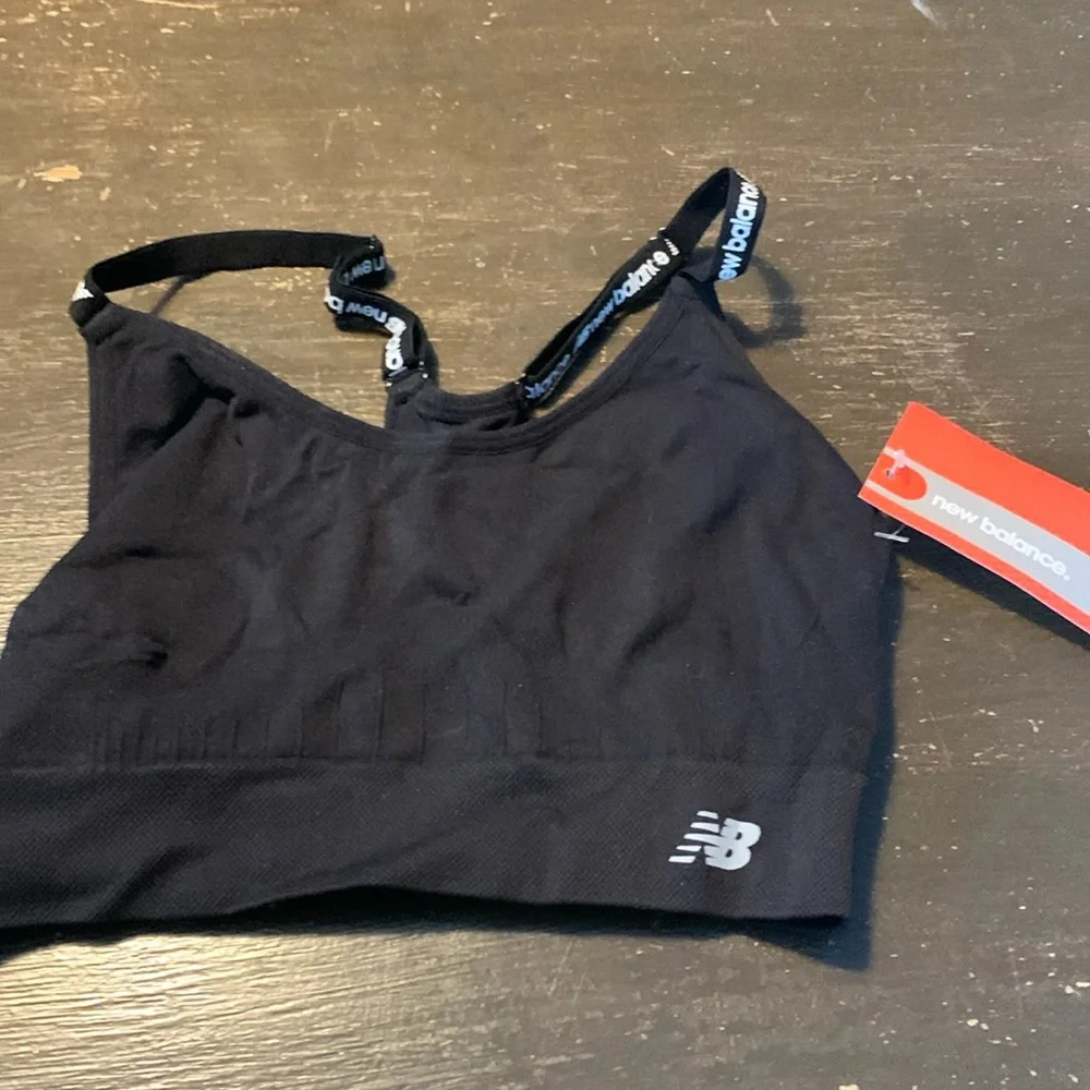 New Balance logo strap‎ sports bra. NWT . Retail 28